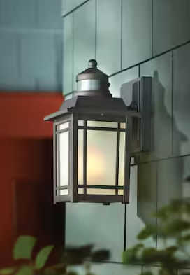 Home Decorators Collection Port Oxford 10.6 in. 1-Light Oil Rubbed Chestnut Motion Sensing Hardwired Outdoor Wall Light Lantern Sconce