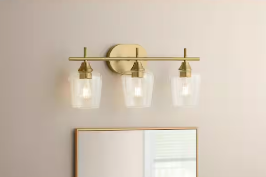 Hampton Bay Pavlen 24 in. 3-Lights Antique Brass Vanity Light with Clear Glass Shades